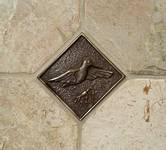 custom bronze hummingbird tile