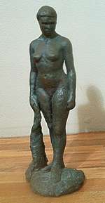 aged bronze figure